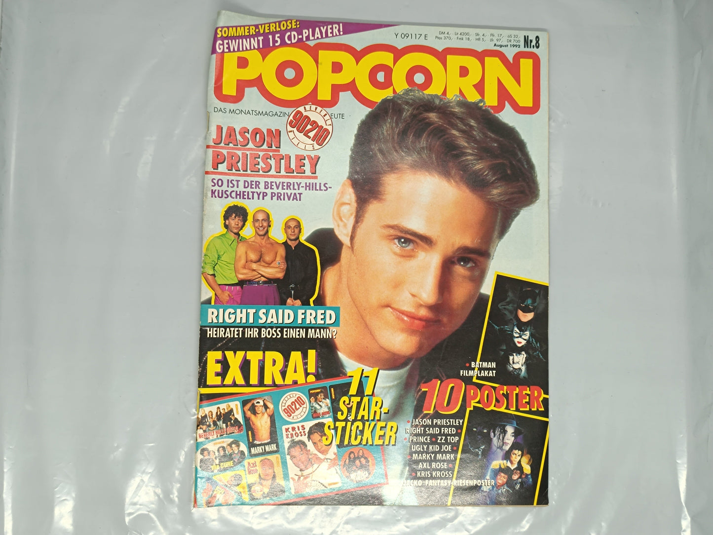 Vintage magazine cover with a person's head on the cover, featuring the word 'HOPPER' and other text.