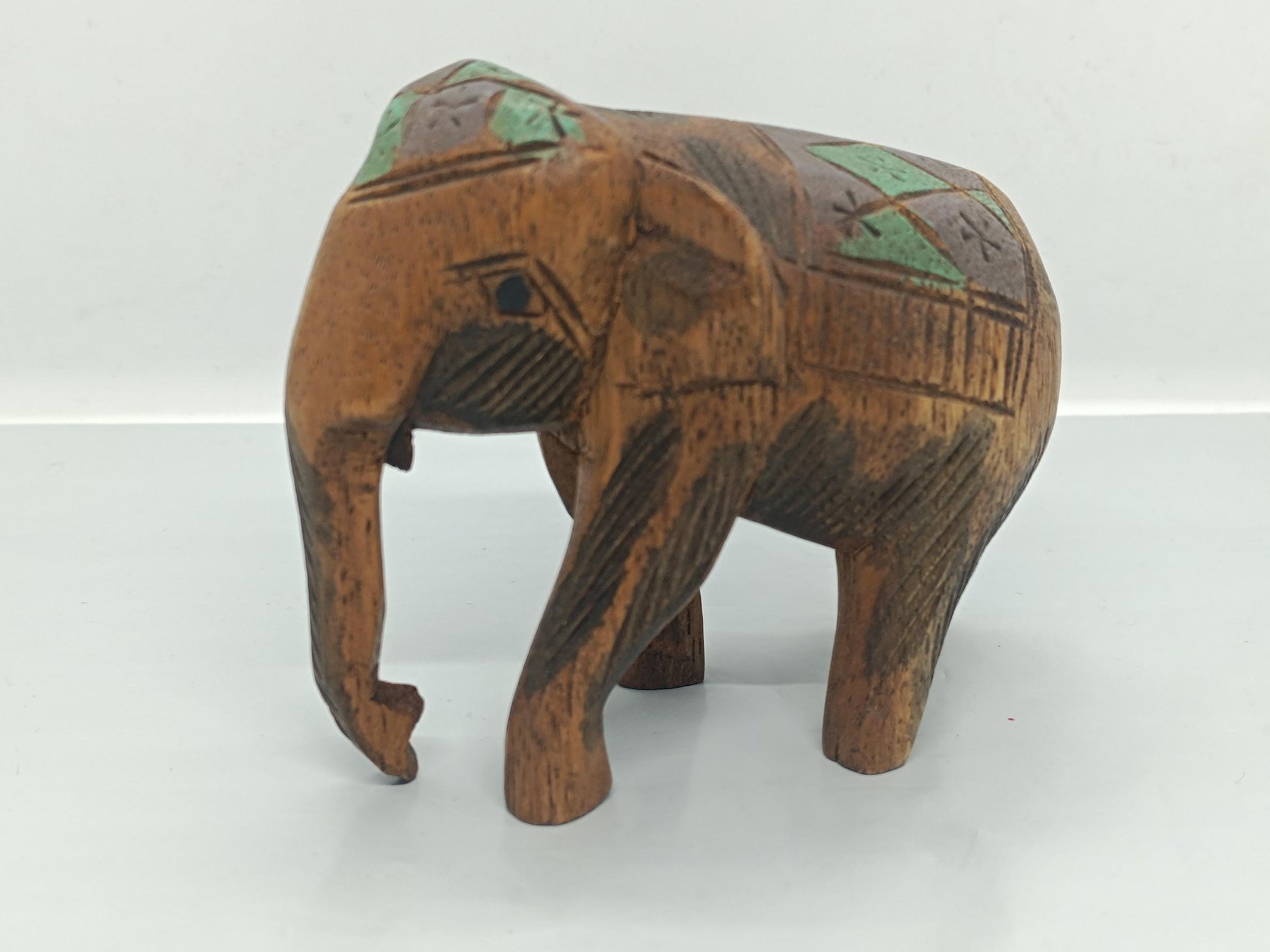 Vintage Hand-Painted Wooden Elephant Figurine (etsy image id: 7687704241)