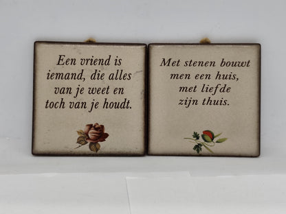 Two ceramic wall tiles with sayings for every home.