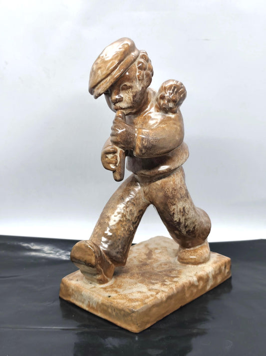 Wanderer playing the flute with a hedgehog Mosbacher Majolika